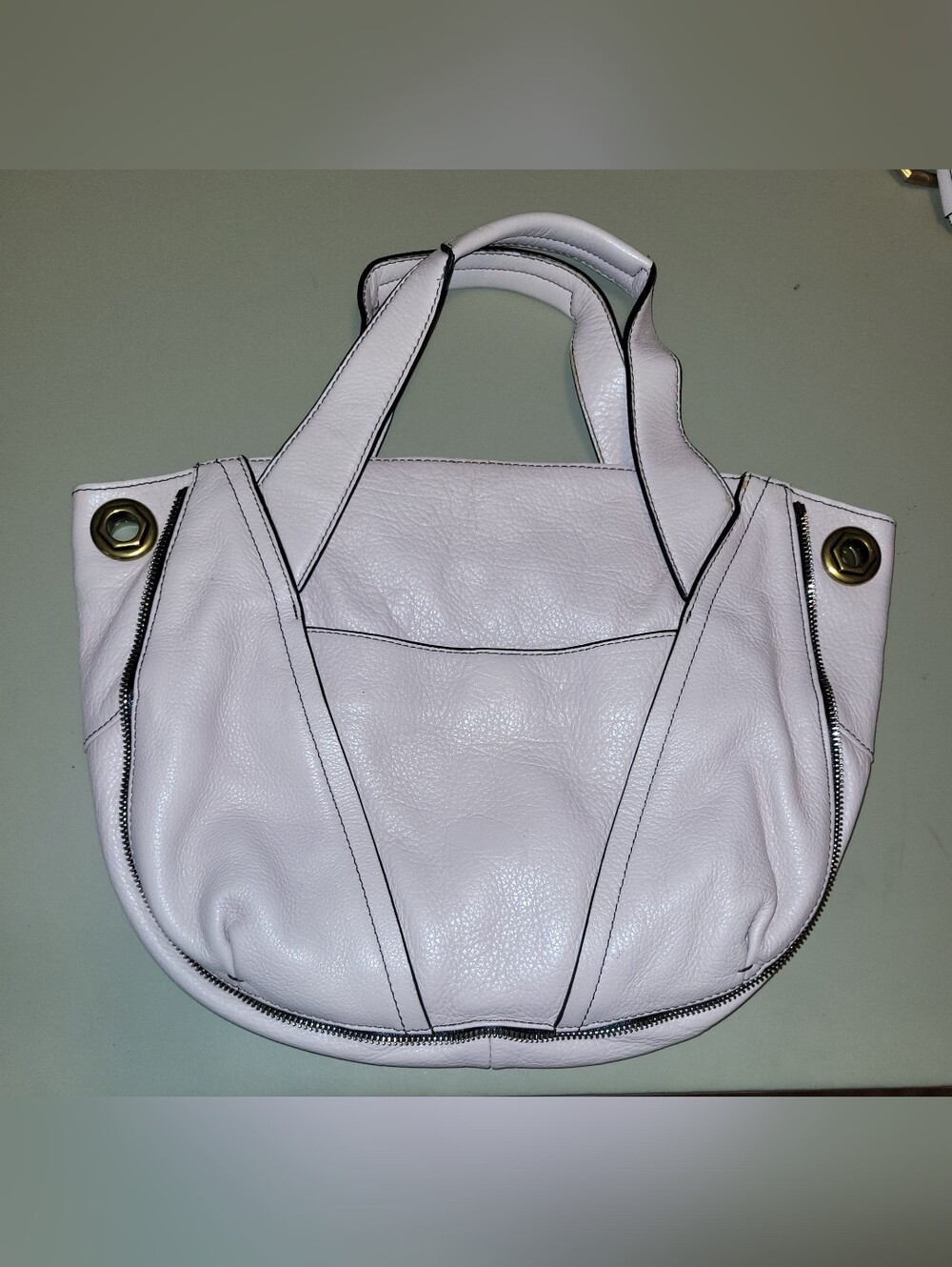 Oryany Blush Leather Shoulder Bag with Gold Turn-Lock Top Zip Bag.